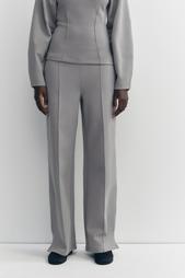 INTERLOCK KNIT TROUSERS WITH VENTS