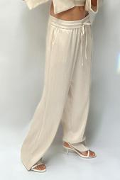 CREASED-EFFECT WIDE-LEG TROUSERS