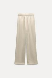 CREASED-EFFECT WIDE-LEG TROUSERS