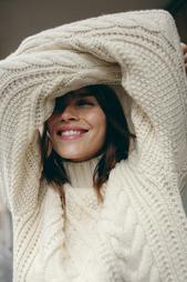 CABLE-KNIT SWEATER