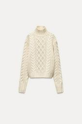 CABLE-KNIT SWEATER