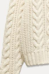 CABLE-KNIT SWEATER