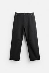 FLARED TROUSERS WITH SEAM DETAILS