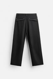 FLARED TROUSERS WITH SEAM DETAILS